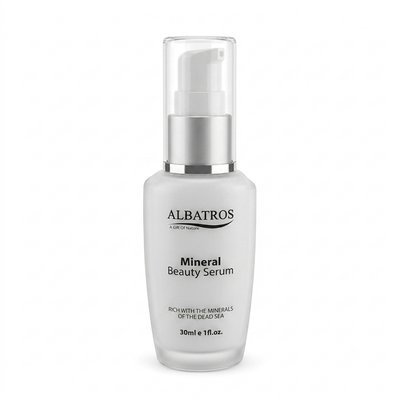 Albatros Mineral Beauty Serum in a frosted glass pump bottle with a silver collar and clear cap, on a white background.