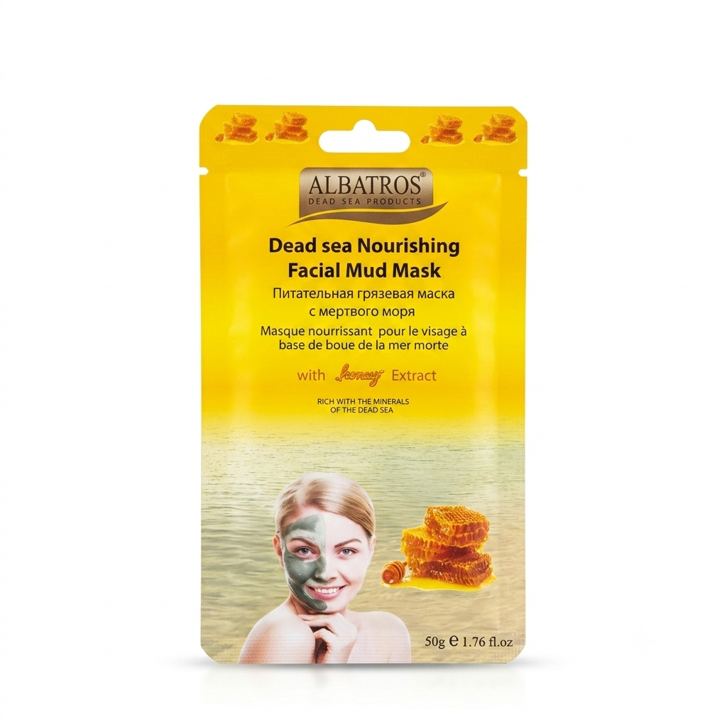 Albatros Dead Sea Nourishing Facial Mud Mask in a yellow resealable pouch with a beach-themed design, honey jar graphic, and a woman applying the mask, on a white background.
